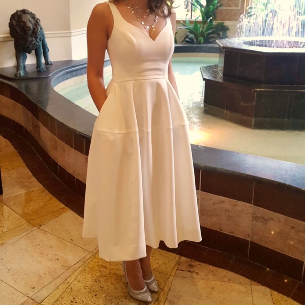 Jill Stuart white midi a-line dress with pockets.